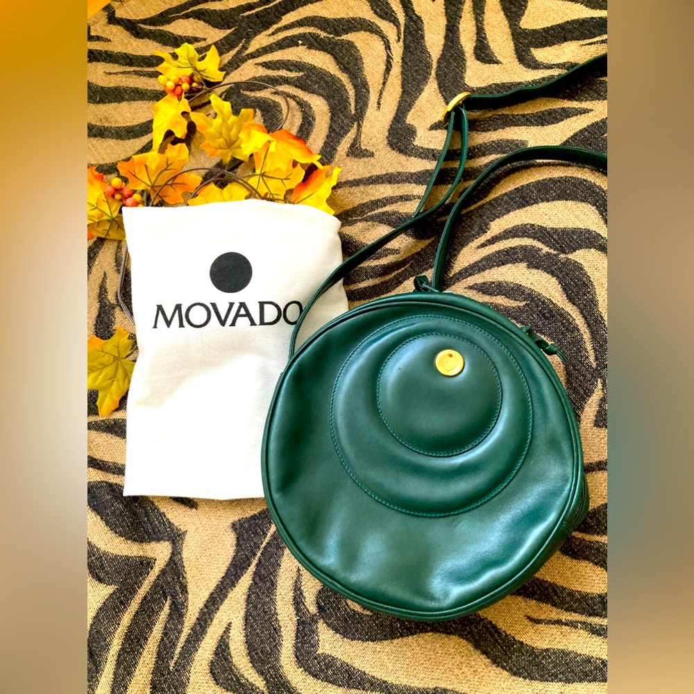 Movado Classic round cross body bag.
